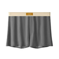 Pack of three pairs of men's solid colour ice silk underwear on a white background.
