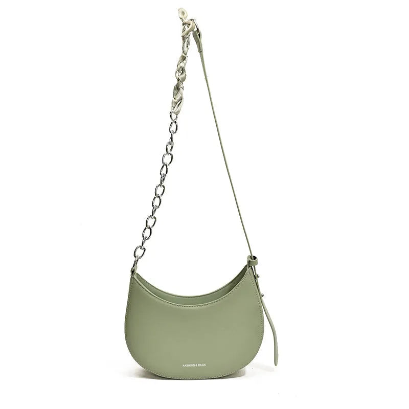 Small PU leather saddle bag on a flat surface, available in black, brown, coffee, green, khaki, and white