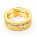 Women's geometric zircon ring in gold electroplated copper showing structured design lines