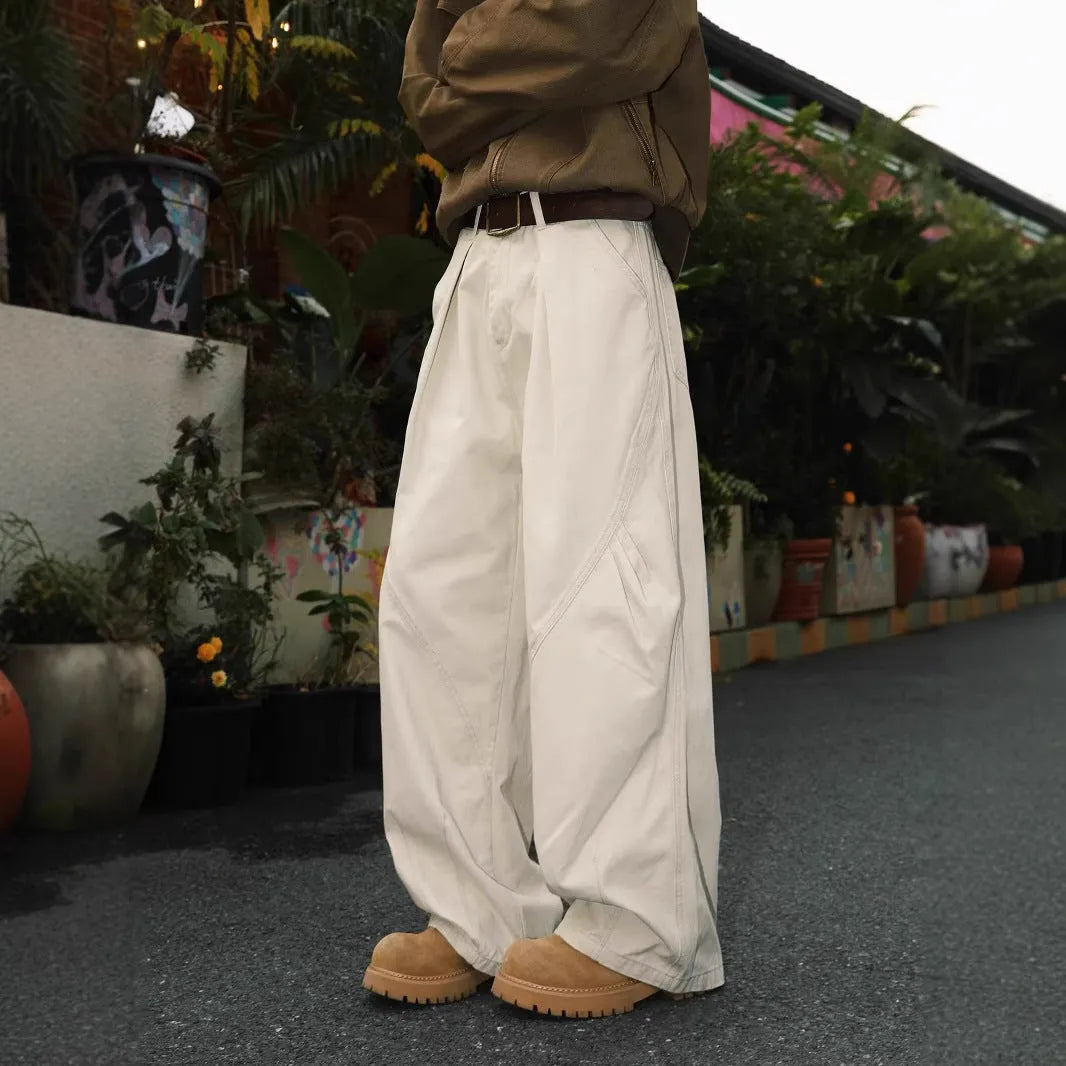 Men's pleated straight leg trousers in cotton-polyester blend with elastic waist available in black, brown, apricot