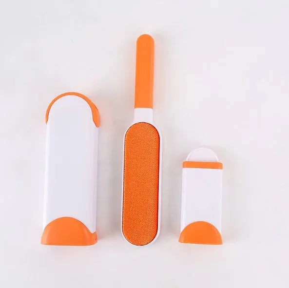 Reusable pet hair removal brush with double-sided roller and self-cleaning base