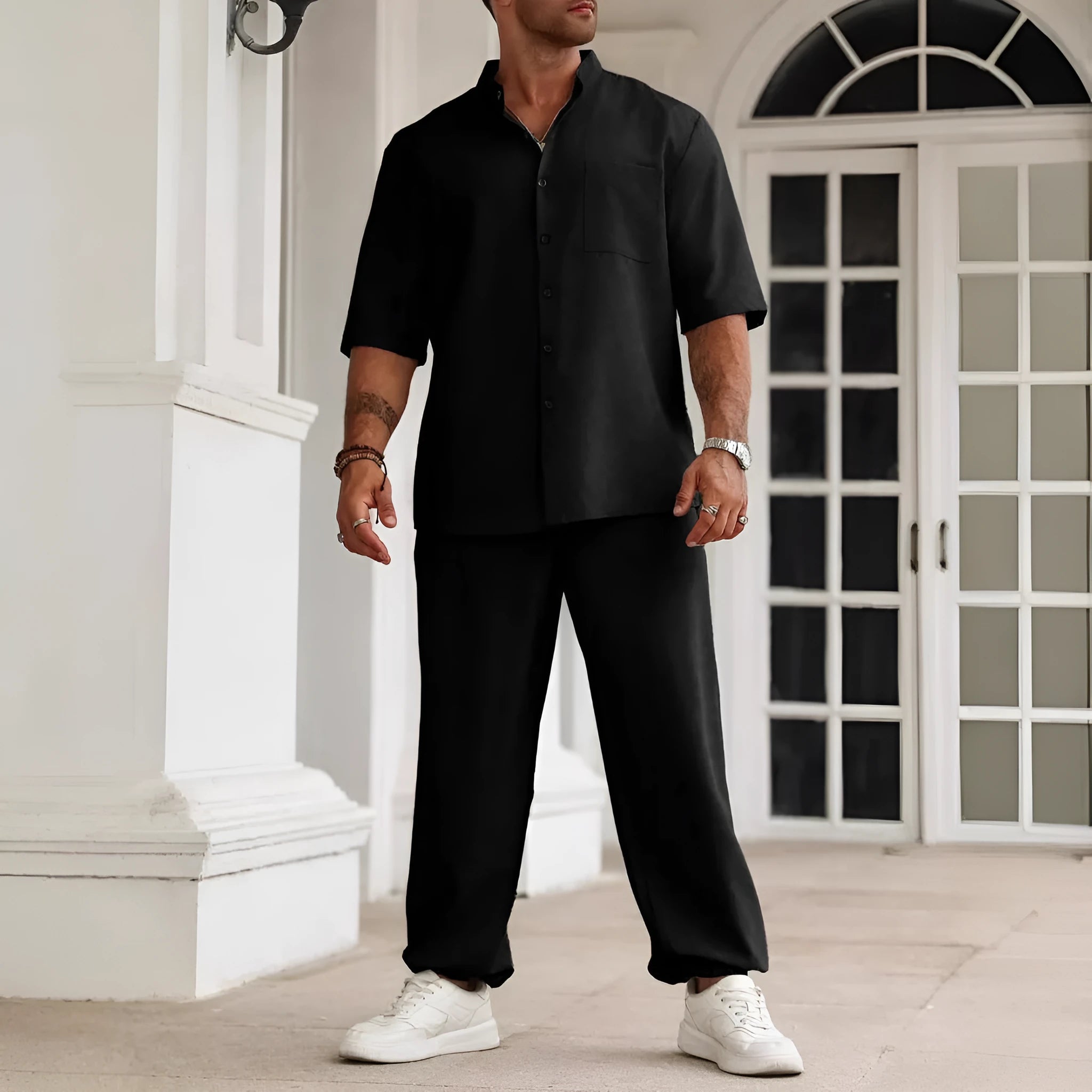 Men's casual apricot coloured cotton linen short sleeve shirt and trousers set laid flat.