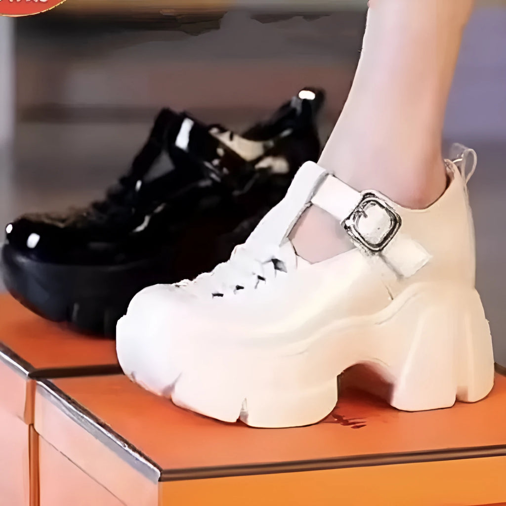 Women's black and white satin pumps with chunky wedge heel and hollow-out design
