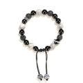 A black agate map stone volcanic rock bracelet with diamond-shaped beads in a New Chinese style unisex design.