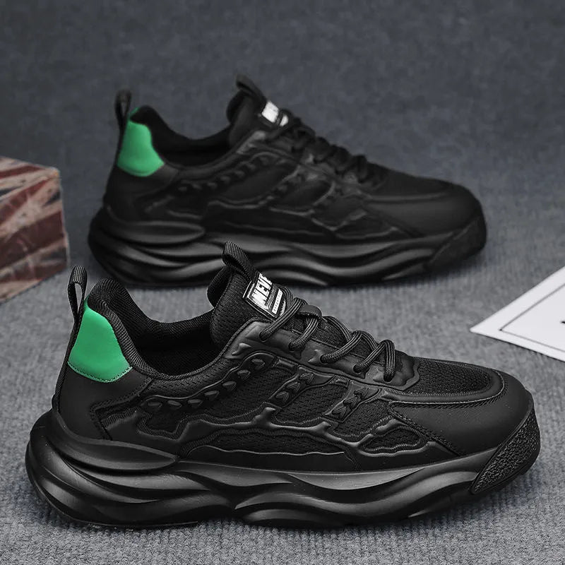 Men's white and black breathable mesh casual shoes with round toe, shown from the side.