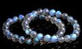 Natural cream crystal bracelet with blue moonlight design and polished beads
