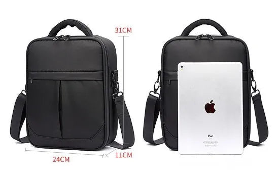 Black oxford fabric men's messenger bag with shoulder strap and carry handle.