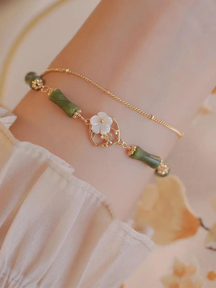 Natural green olivine stone bracelet with twin bells and double layer design
