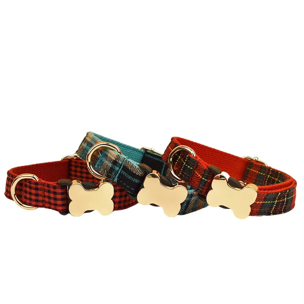 Flat nylon dog collar with a printed grid pattern and a central bone-shaped metal buckle.