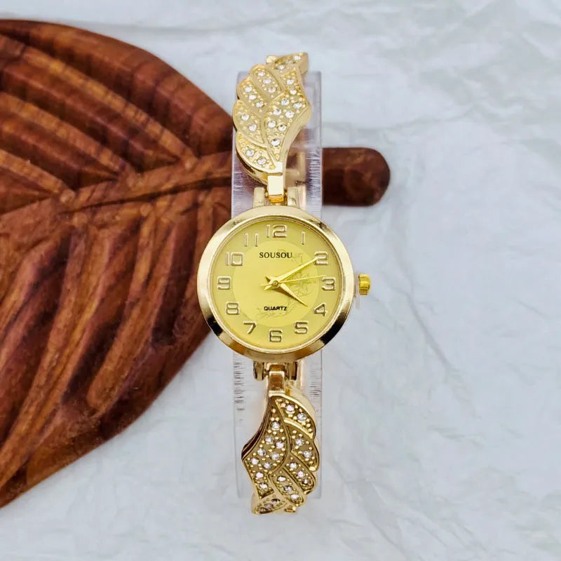 Women's stainless steel watch with round dial showing gold surface option and vachette clasp buckle