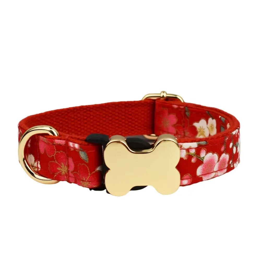 Flat nylon dog collar with a printed grid pattern and a central bone-shaped metal buckle.