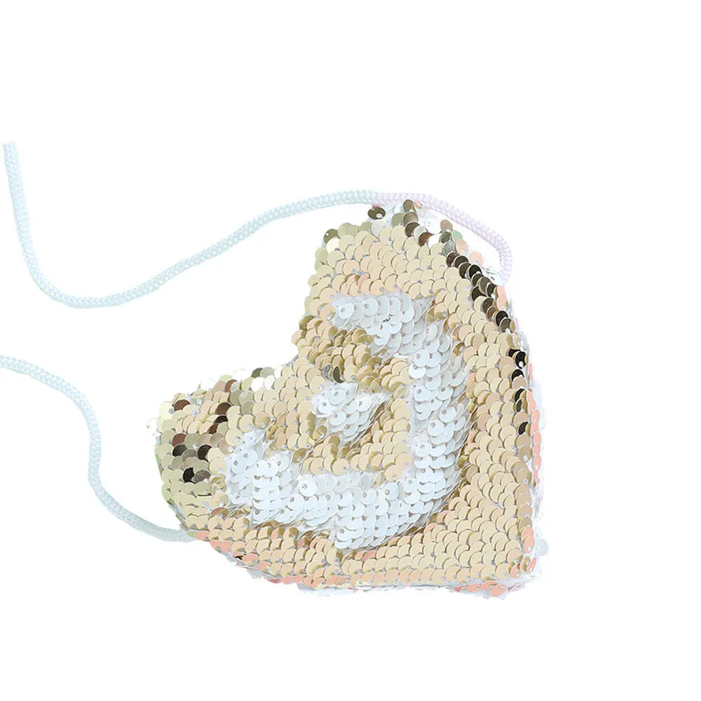 Sequined heart-shaped crossbody purse in gold with lanyard strap