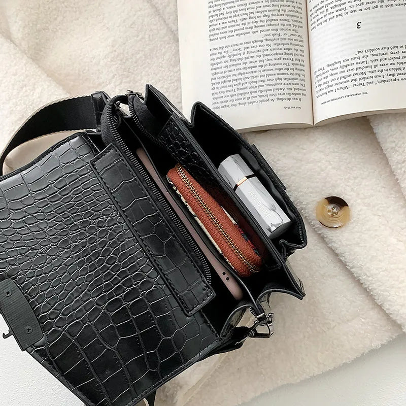 Vintage PU crossbody bag in black, shown with measurements and internal polyester lining