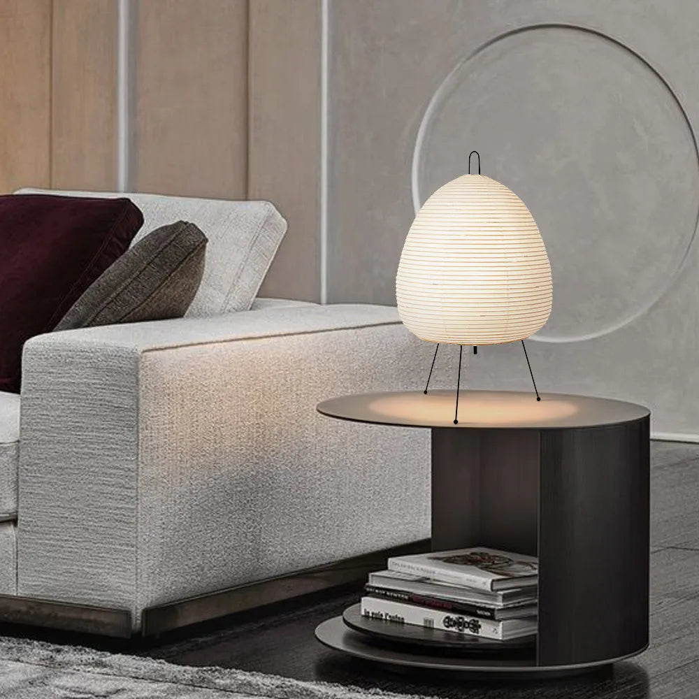 Handmade Nordic-style table lamp with a Japanese rice paper shade and aluminium base on a wooden table