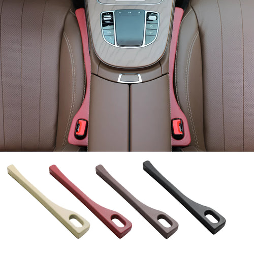 Flexible polyurethane car seat gap filler strip in beige colour on a car seat.