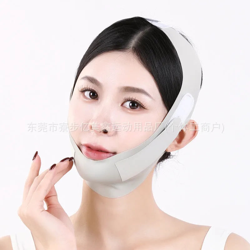 Small V face shaping mask in purple and green colours with breathable fabric construction