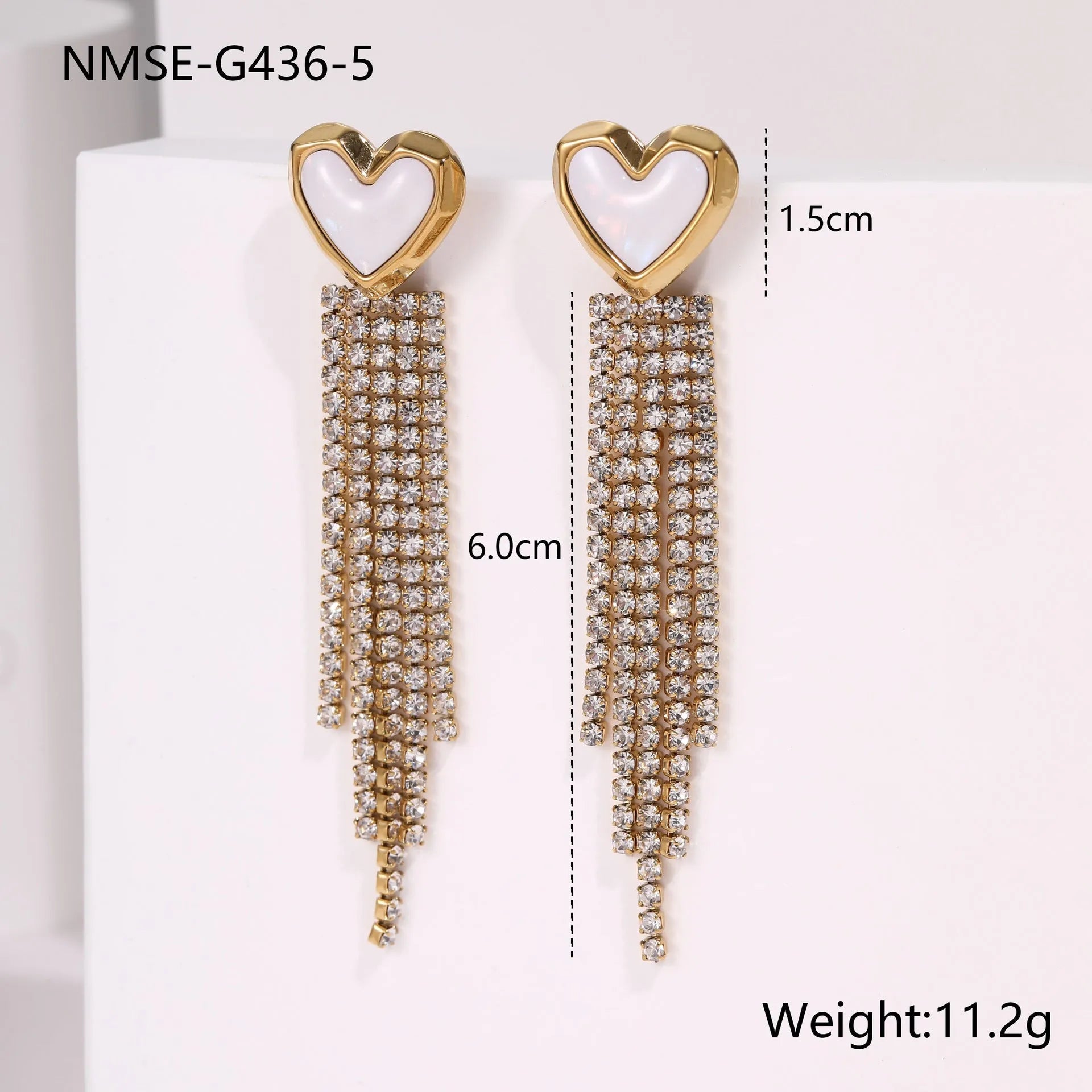 Stainless steel heart-shaped earrings with geometric star detailing and 18K gold electroplated finish