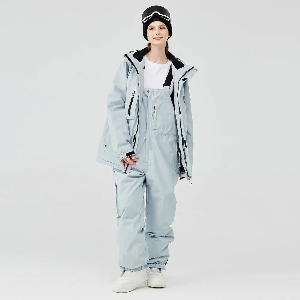Men's and women's winter ski suit in blue and black colour combination for snow sports