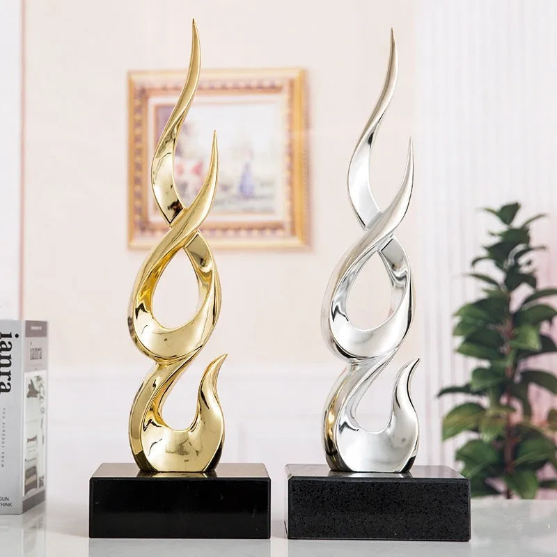 A selection of handmade resin festival decorations in gold, silver, and gradient colours on a festive background.