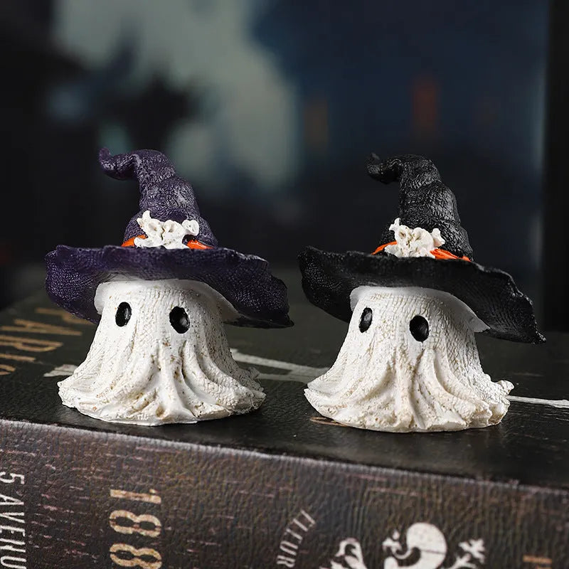Resin wizard hat holiday ornament in purple or black, 7cm tall.