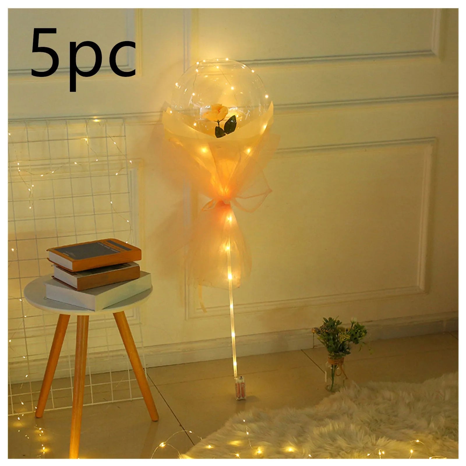 Transparent LED luminous balloon with artificial rose and built-in light, shown as a DIY bouquet kit.
