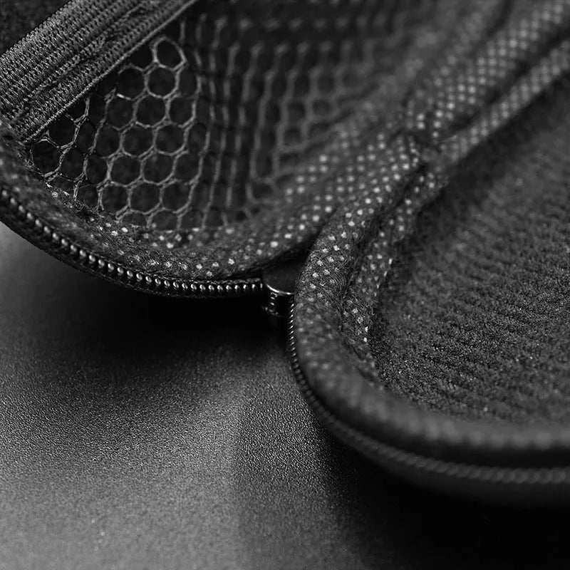 Black oval leather earphone storage bag with zipper closure for headphone protection
