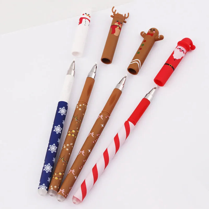 Four erasable gel pens in red, black, green, and blue with Christmas themes on a white background