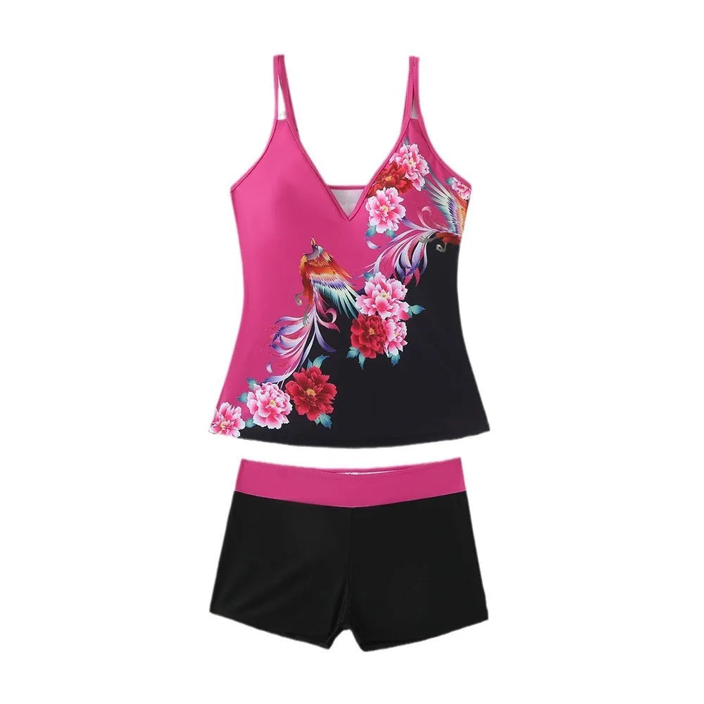 Plus size black printed swimsuit briefs for women on a hanger.
