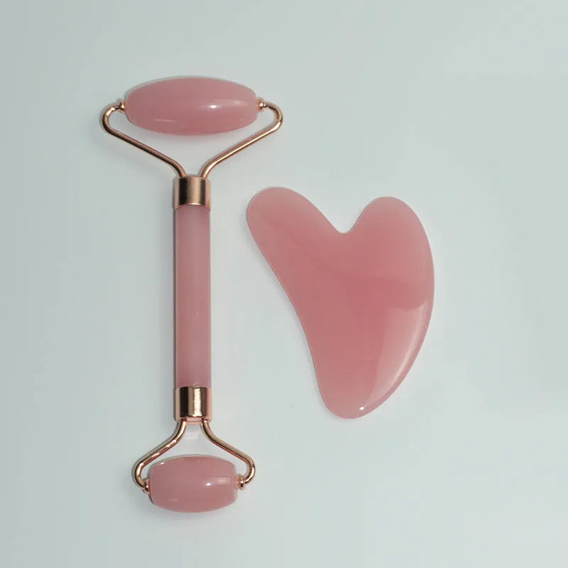 Stainless steel facial massage board with double head roller and heart-shaped eye poking stick for acupressure therapy