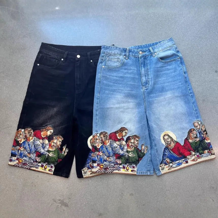 Blue men's cotton shorts with a Jesus design printed on the back pocket, showing tapered leg fit.