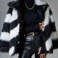 Faux fur coat with contrasting colour lapel and a attached fur collar.