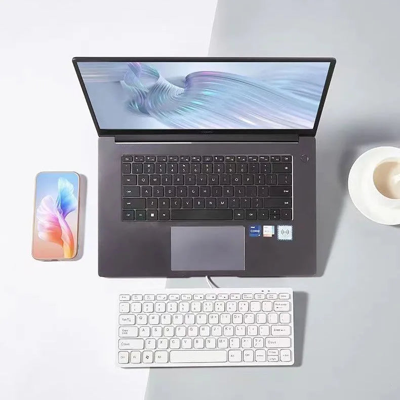 Compact wired USB keyboard in blue colour showing 280mm width and noiseless keys