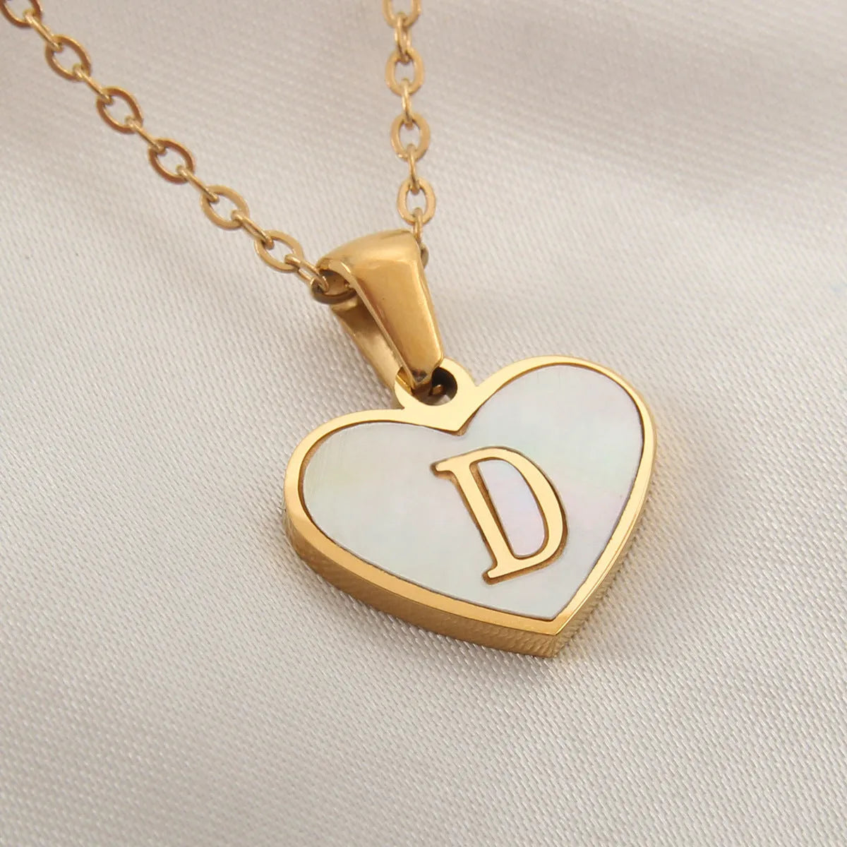 Gold plated personalised heart necklace with white shell on a 45cm chain