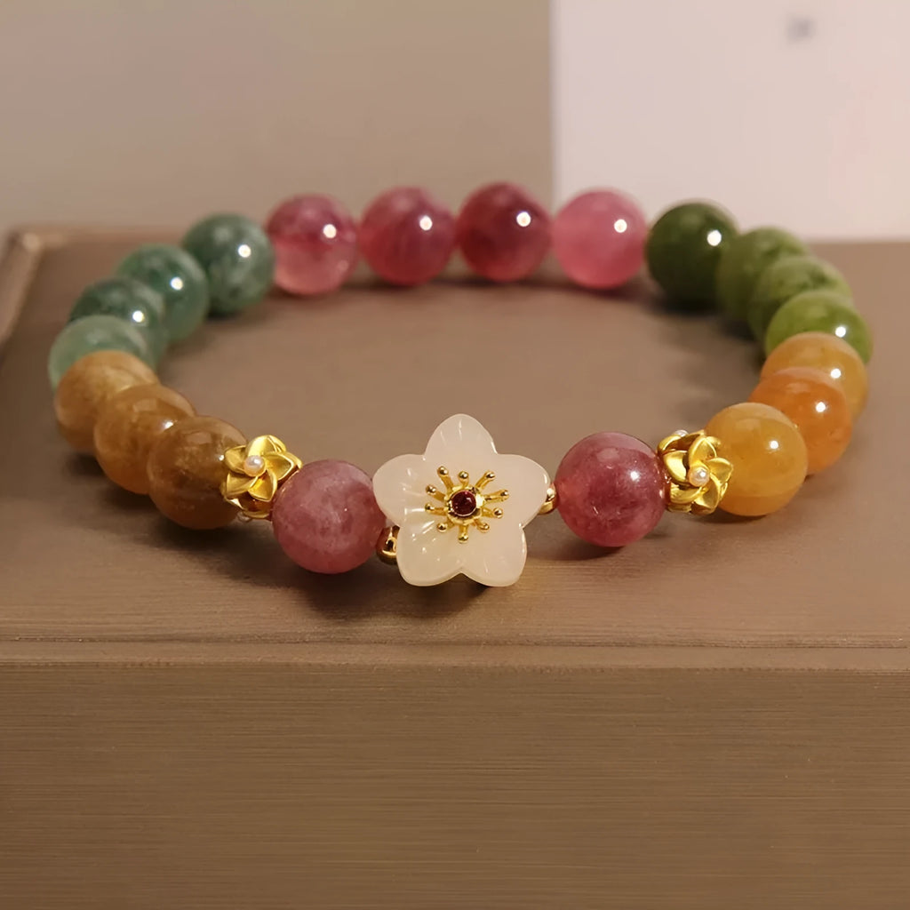 Natural colour tourmaline bracelet showing floral design option with electroplated silver finish