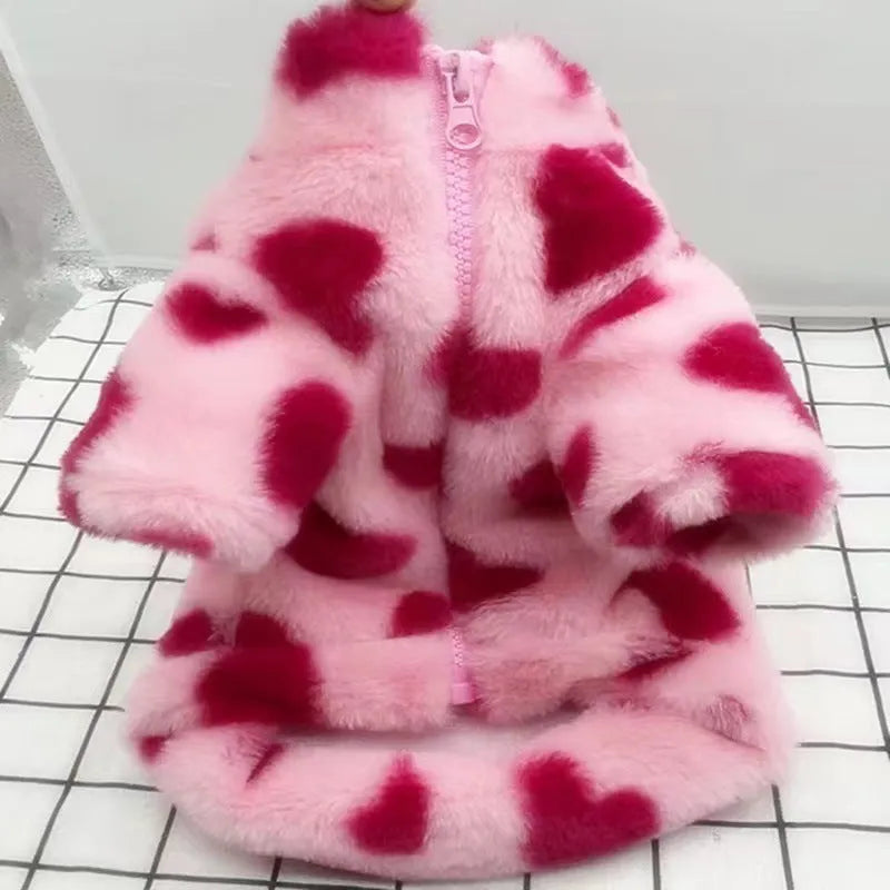 Small dog wearing plush polyester warm coat in British styling, available in pink or brown colour