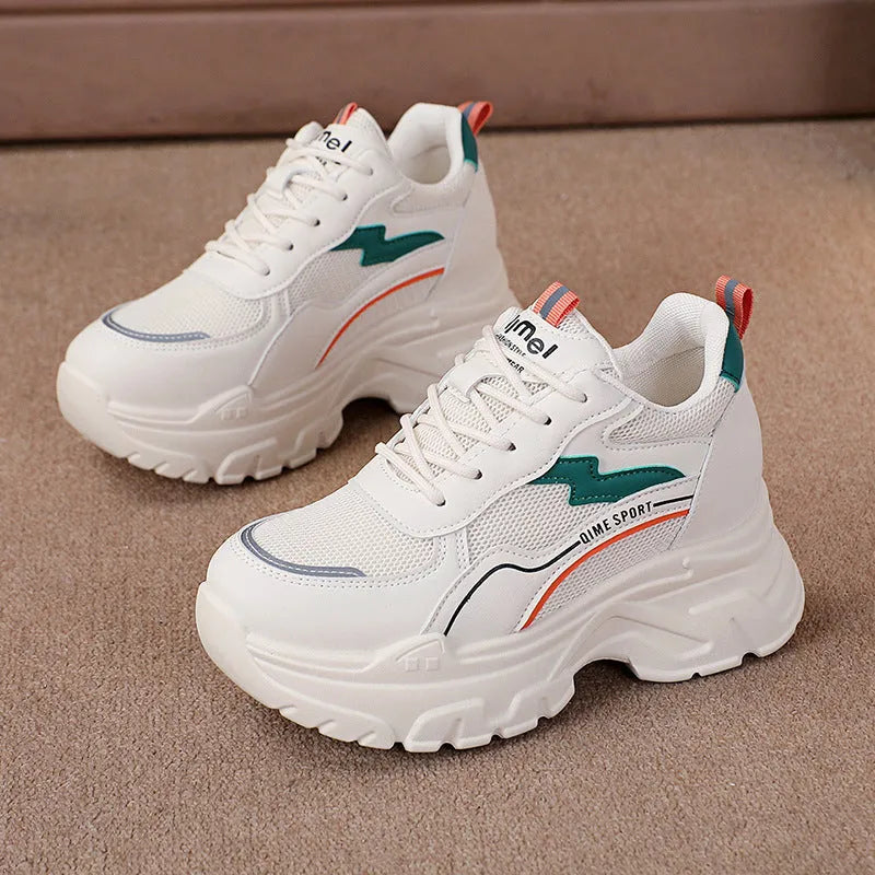 Women's white and beige dad shoes with cross straps and height increasing insoles