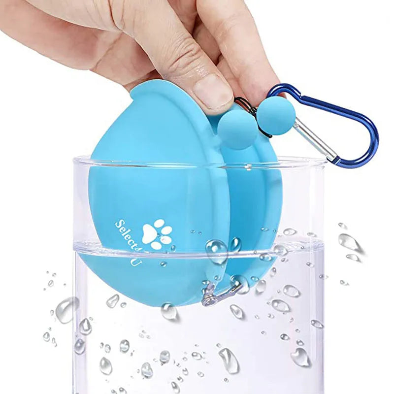 Yellow silicone dog treat pouch attached to waist belt for hands-free training