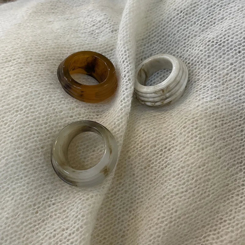 Chinese style irregular geometric wide resin ring in brown or white latte colour.