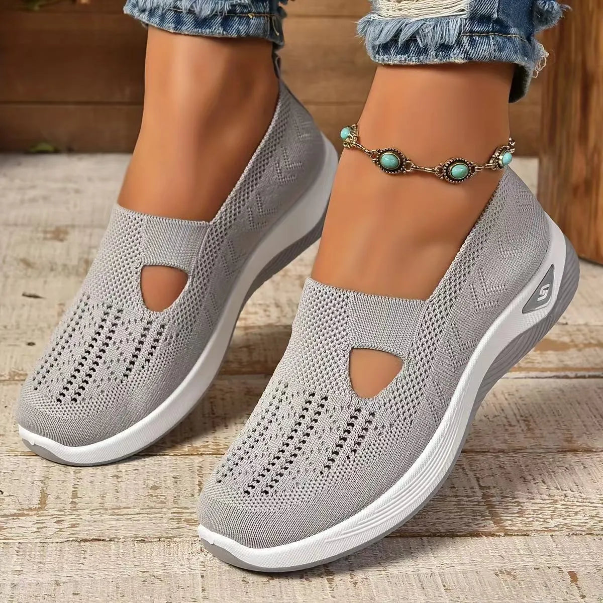Women's casual mesh flat shoes with a T-bar strap and round toe in multiple colours.