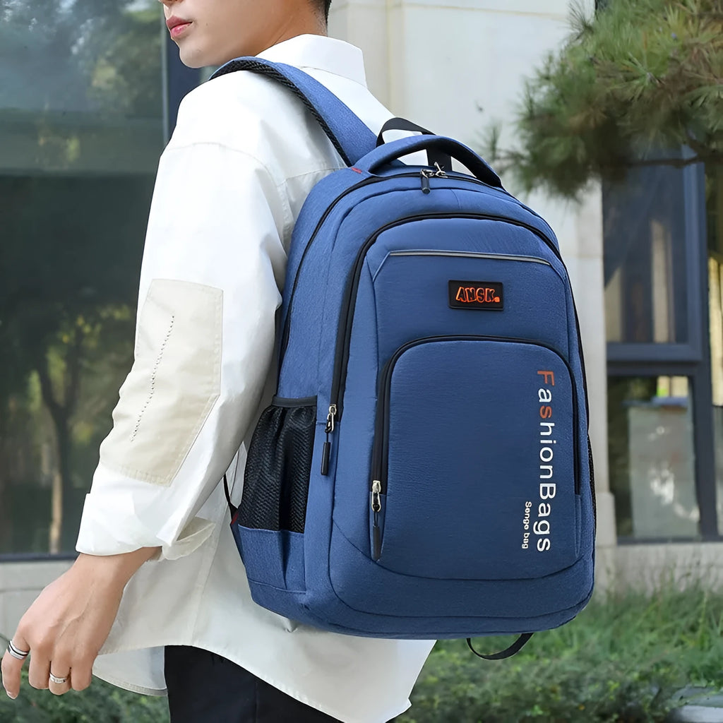 Street style nylon travel backpack showing multiple compartments including laptop sleeve, shown in dark green colour