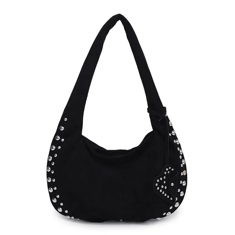 A soft plush underarm tote handbag in a retro style, shown in a colour option.