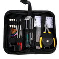 Black plastic and metal guitar repair tool kit for guitar, bass, mandolin, banjo.