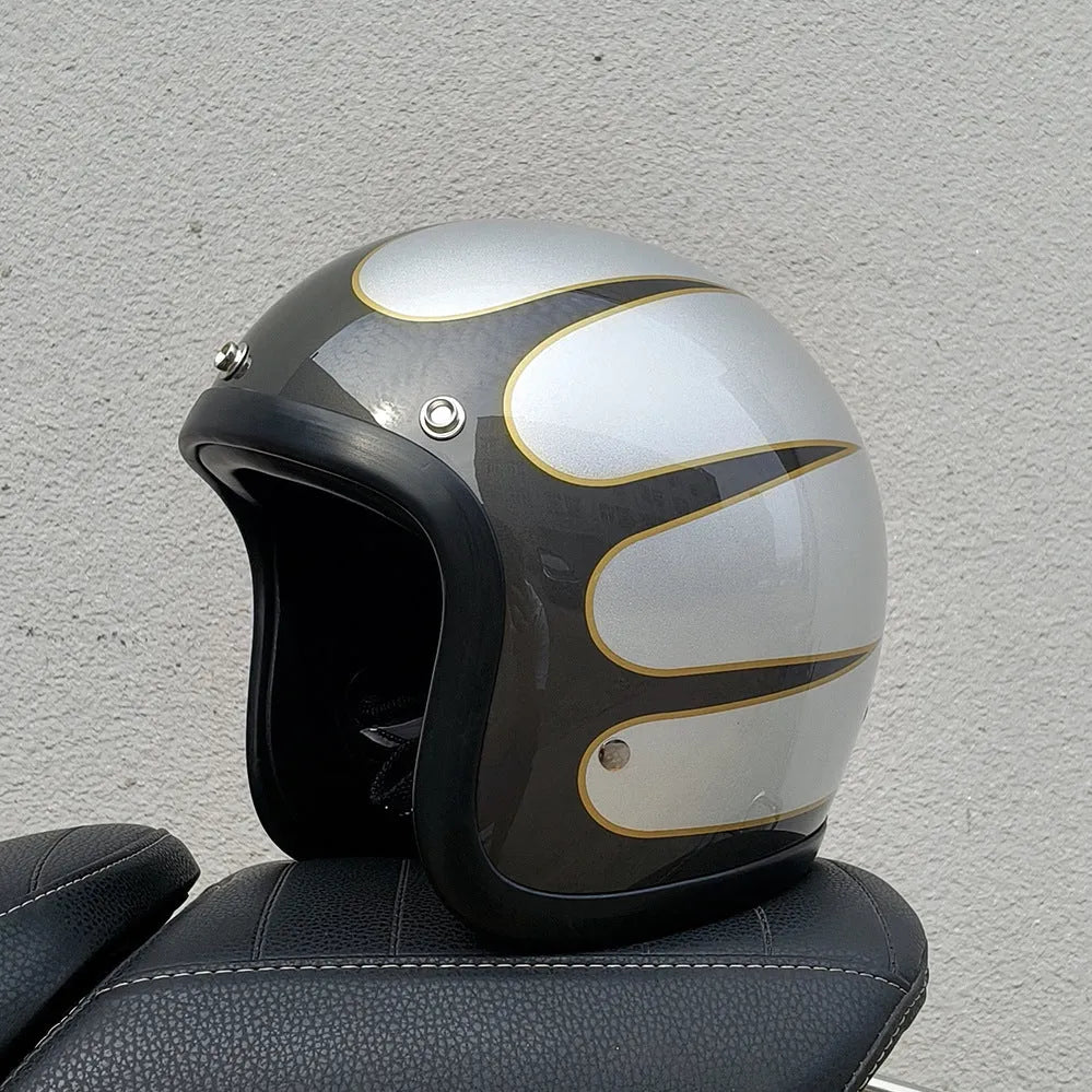 Retro-style half helmet for motorcycles with a fibreglass shell shown in a cement grey colour.