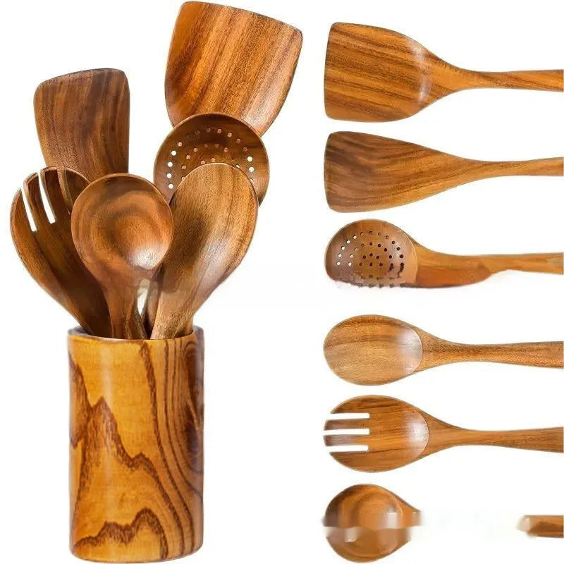 Boxed set of seven wooden kitchen utensils including cooking spoons, a spatula, and soup spoons.