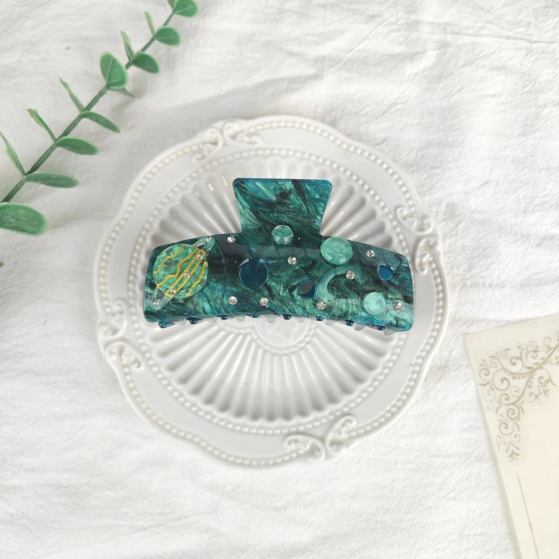 Oversized women's barrette hair clip with a starry sky pattern in sky blue.
