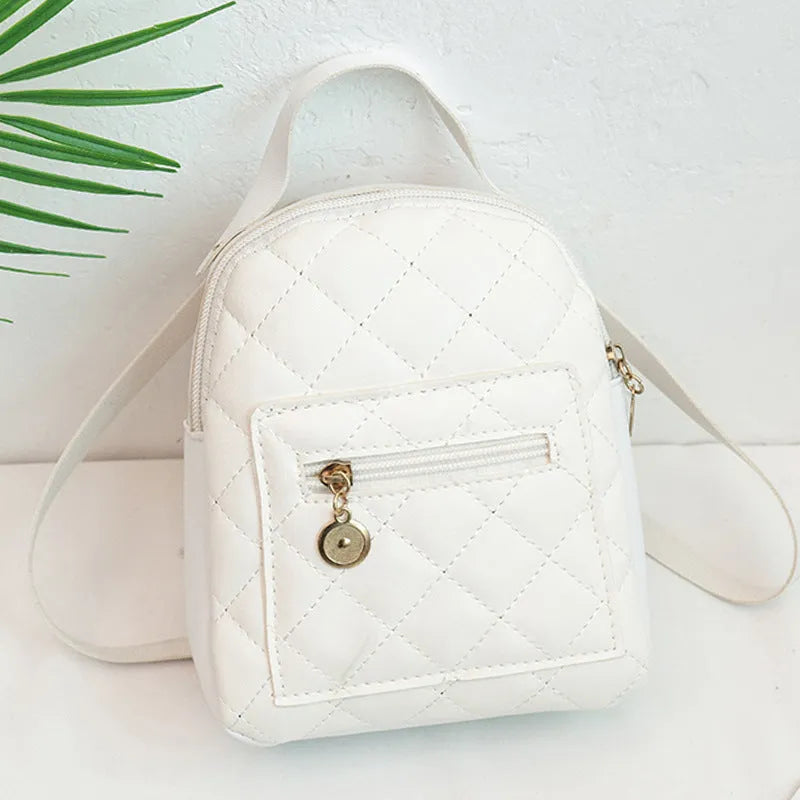 Girls' hard shell square backpack with Korean embroidery in black, pink or white colours showing sandwich pockets and carry handle