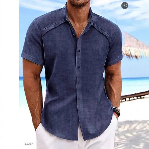 Hawaiian casual short sleeve solid colour shirt in a cotton blend fabric on a hanger.