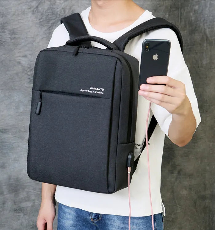 Waterproof rechargeable laptop backpack in black showing shoulders style design with Oxford cloth construction
