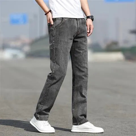 Men's straight leg jeans in smoky grey colour with a low waist and zipper fly