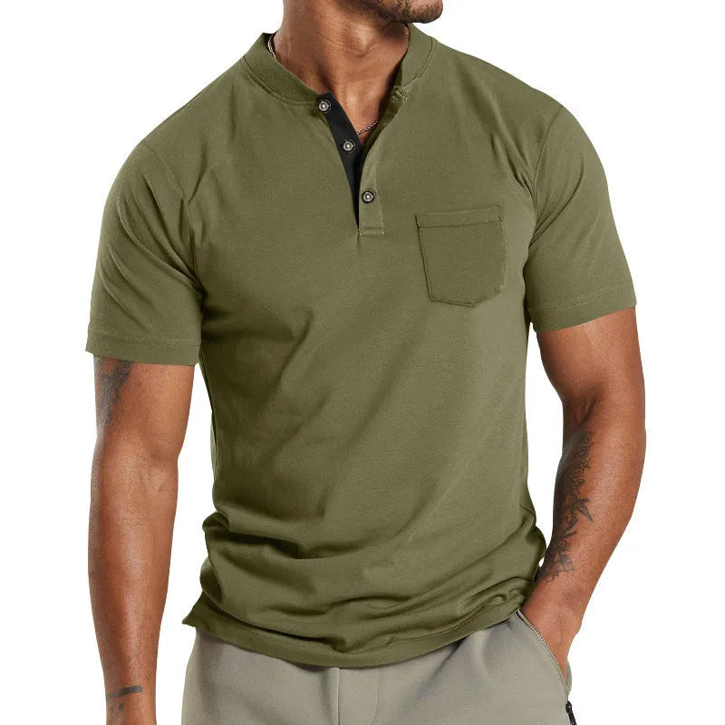 Plus size man wearing a light grey short sleeve casual shirt with a button chest pocket.